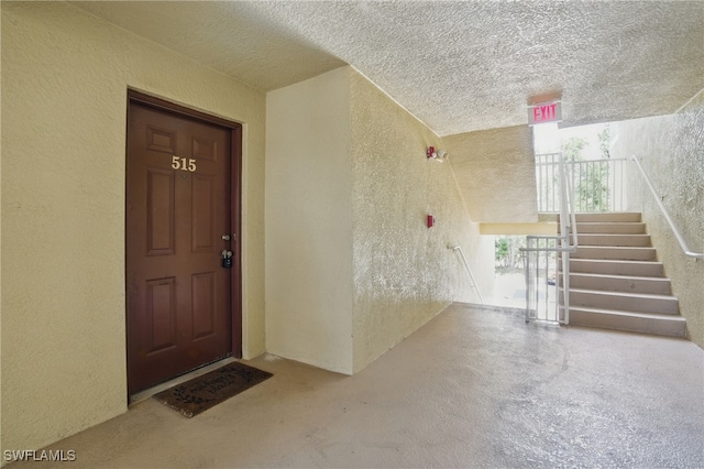 4109 Residence Dr Unit 515, Fort Myers, FL 33901 - doorway to property with stucco siding