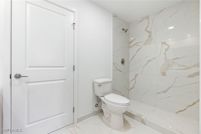 713 Wells Ave, Lehigh Acres, FL 33972 - full bathroom featuring toilet, a marble finish shower, baseboards, and marble finish floor