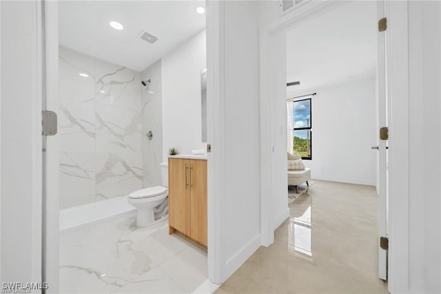 bathroom with vanity, a marble finish shower, marble finish floors, toilet, and recessed lighting