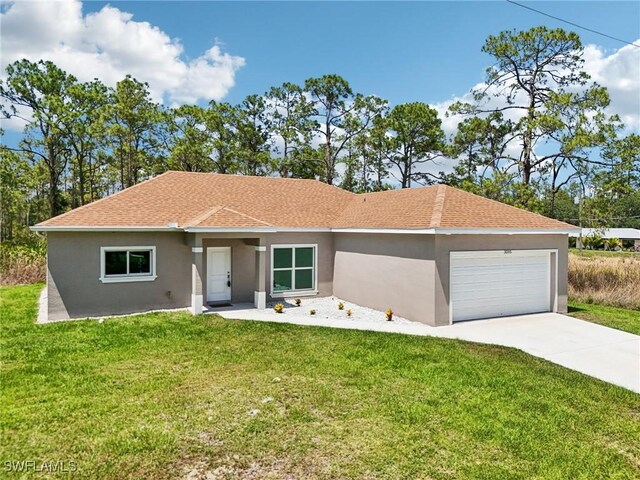single story home with stucco siding, a garage, a front lawn, concrete driveway, and a shingled roof