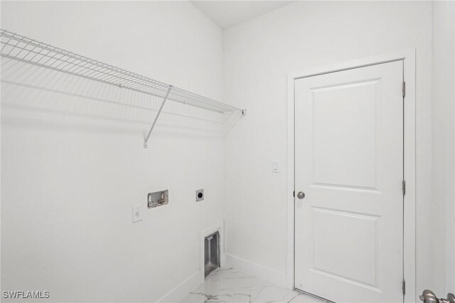 laundry room featuring electric dryer hookup, baseboards, light marble finish flooring, and hookup for a washing machine