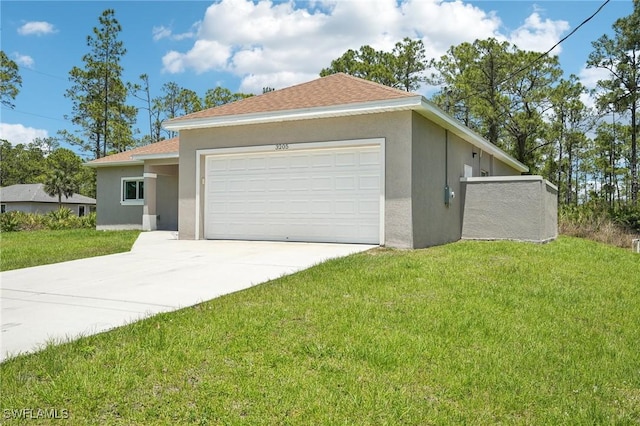 view of front of home with stucco siding, driveway, an attached garage, and a front yard