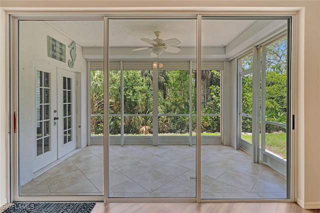 unfurnished sunroom featuring french doors and healthy amount of natural light