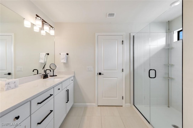 10427 Ventana Ln, Naples, FL 34120 - bathroom featuring tile patterned flooring, a shower stall, vanity, and baseboards
