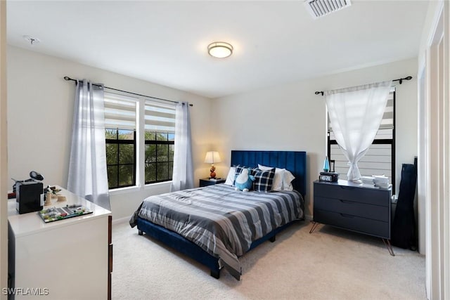 10427 Ventana Ln, Naples, FL 34120 - bedroom featuring light carpet