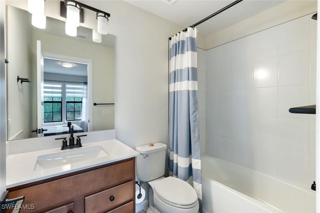 10427 Ventana Ln, Naples, FL 34120 - ensuite bathroom featuring vanity, toilet, and shower / bath combination with curtain