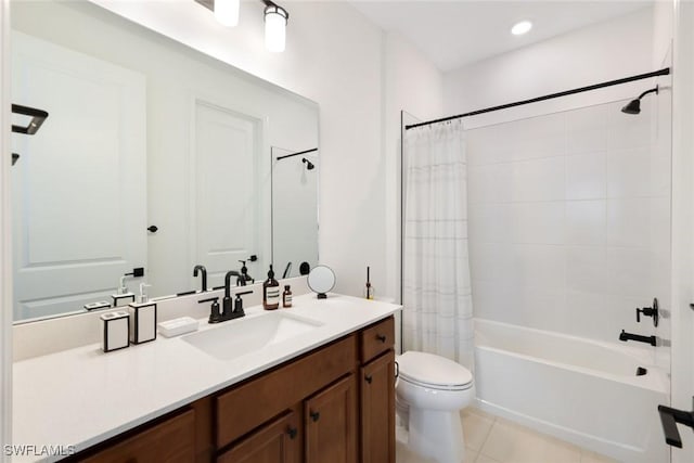 10427 Ventana Ln, Naples, FL 34120 - full bathroom featuring toilet, shower / bath combo with shower curtain, vanity, and tile patterned flooring