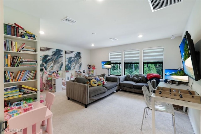 10427 Ventana Ln, Naples, FL 34120 - carpeted living area featuring recessed lighting