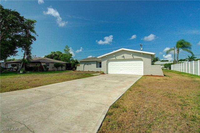 ranch-style home featuring concrete driveway, stucco siding, and an attached garage