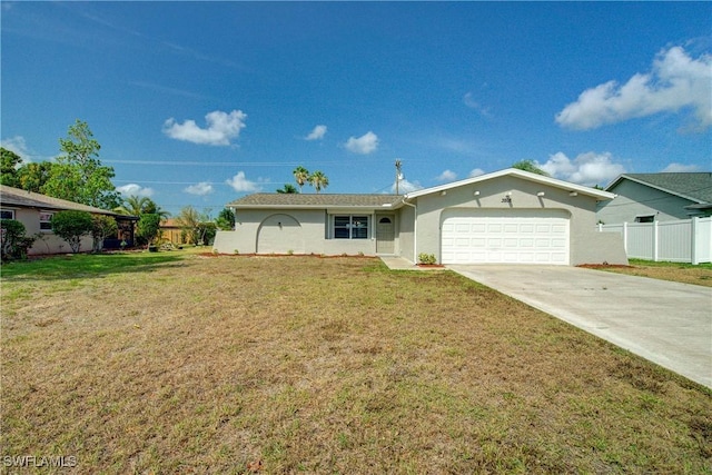 ranch-style home featuring stucco siding, an attached garage, and concrete driveway