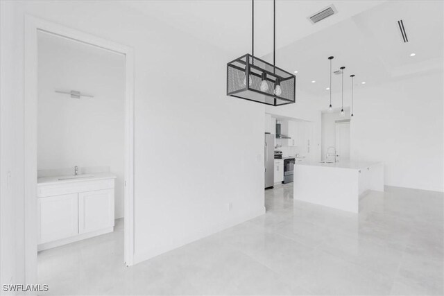 305 Diplomat Pkwy E, Cape Coral, FL 33909 - garage with recessed lighting and a sink