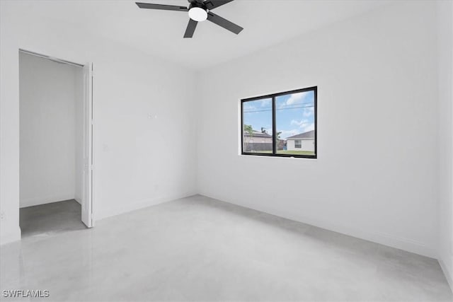 305 Diplomat Pkwy E, Cape Coral, FL 33909 - unfurnished bedroom featuring concrete flooring and ceiling fan