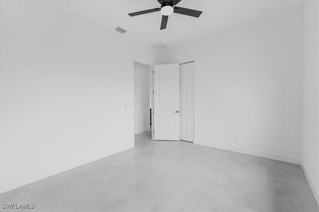 305 Diplomat Pkwy E, Cape Coral, FL 33909 - unfurnished room featuring ceiling fan and concrete floors