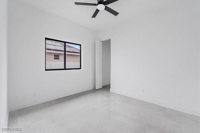 305 Diplomat Pkwy E, Cape Coral, FL 33909 - unfurnished room featuring a ceiling fan, concrete floors, and baseboards
