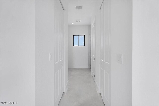 305 Diplomat Pkwy E, Cape Coral, FL 33909 - corridor featuring concrete flooring