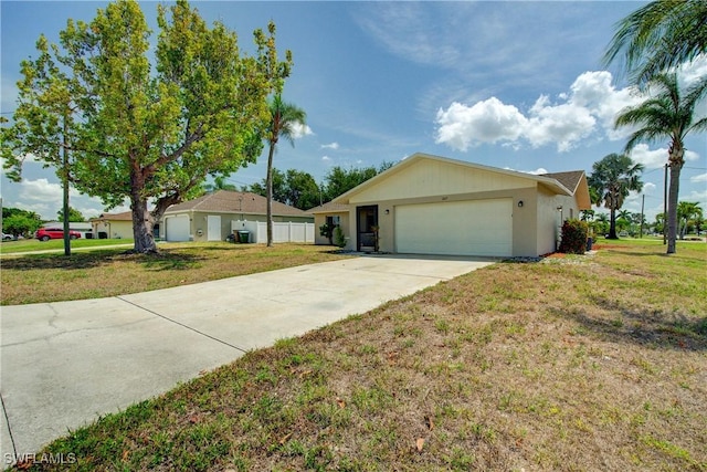 ranch-style home featuring concrete driveway and a garage