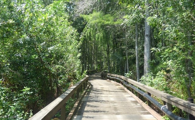 view of property's community with a forest view