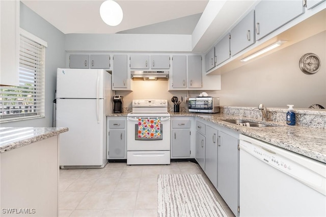 13090 Cross Creek Ct Unit 210, Fort Myers, FL 33912 - kitchen with white appliances, exhaust hood, light stone countertops, and light tile patterned flooring