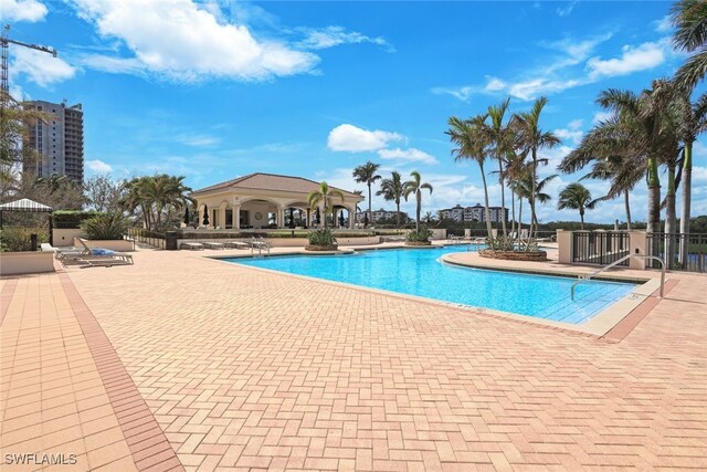 community pool featuring a patio area