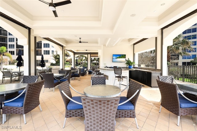sunroom featuring healthy amount of natural light