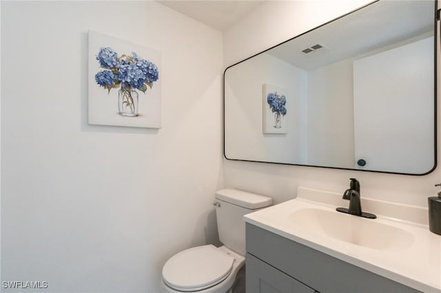 1428 Park Shore Cir Unit 2, Fort Myers, FL 33901 - half bathroom featuring toilet and vanity