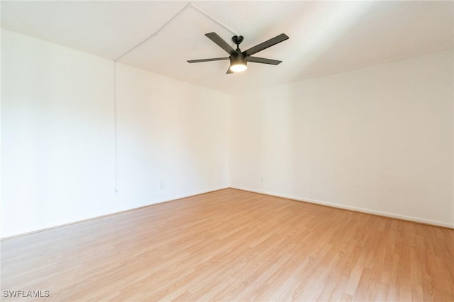 1428 Park Shore Cir Unit 2, Fort Myers, FL 33901 - empty room featuring light wood-type flooring, ceiling fan, and baseboards