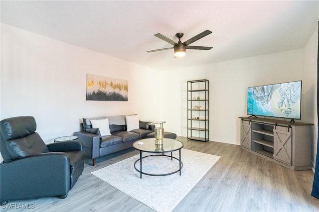 1428 Park Shore Cir Unit 2, Fort Myers, FL 33901 - living area featuring wood finished floors, ceiling fan, and baseboards