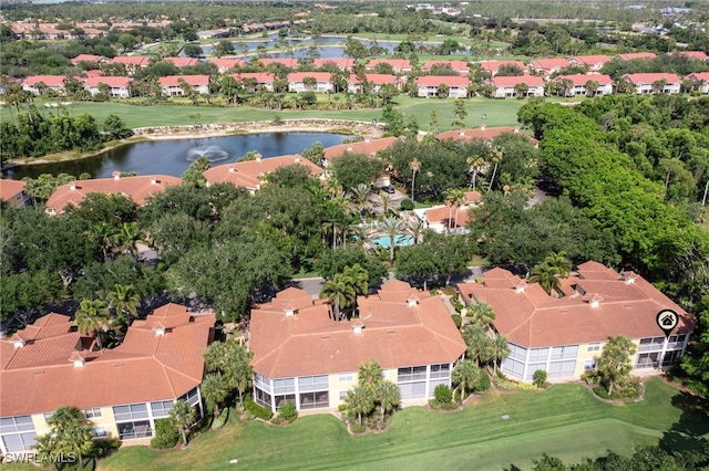 20290 Burnside Pl Unit 1102, Estero, FL 33928 - aerial view of property's location featuring a large body of water, nearby suburban area, and a golf club