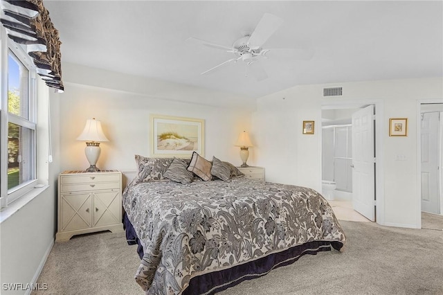 28881 Bermuda Lago Ct Unit 102, Bonita Springs, FL 34134 - bedroom with light carpet, a ceiling fan, and connected bathroom