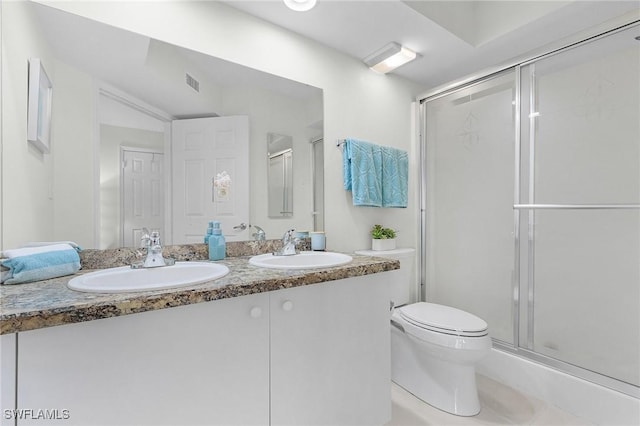 28881 Bermuda Lago Ct Unit 102, Bonita Springs, FL 34134 - full bathroom with double vanity and a shower stall