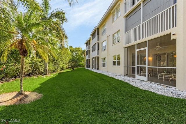 28881 Bermuda Lago Ct Unit 102, Bonita Springs, FL 34134 - view of green lawn with ceiling fan