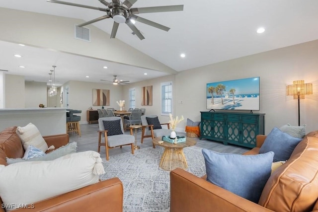 living room featuring ceiling fan, light wood-style flooring, recessed lighting, and lofted ceiling