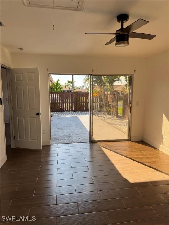 6321 Royal Woods Dr, Fort Myers, FL 33908 - entryway with ceiling fan, wood finish floors, and baseboards