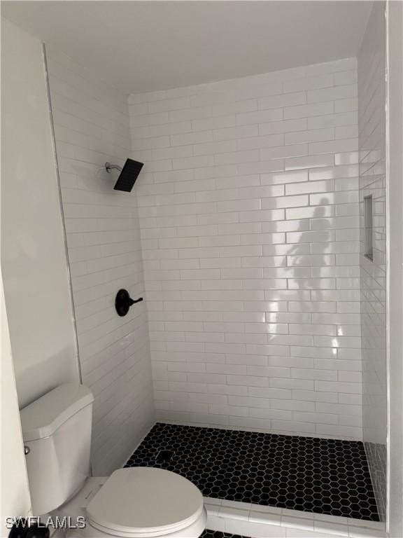 6321 Royal Woods Dr, Fort Myers, FL 33908 - bathroom featuring toilet and a stall shower