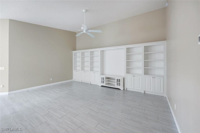 3613 Exuma Way, Naples, FL 34119 - unfurnished room with ceiling fan, baseboards, and high vaulted ceiling