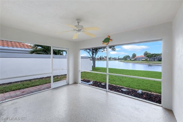 3613 Exuma Way, Naples, FL 34119 - unfurnished sunroom featuring a water view and ceiling fan