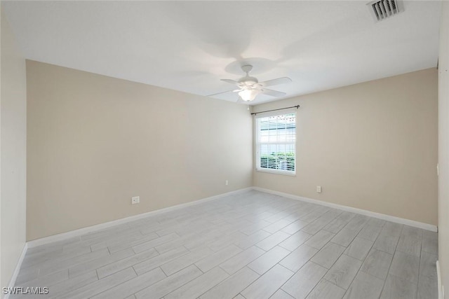 3613 Exuma Way, Naples, FL 34119 - empty room featuring ceiling fan, baseboards, and light wood finished floors