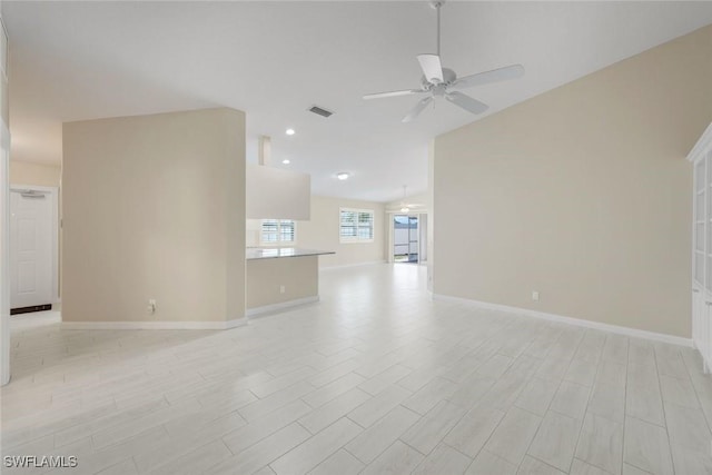 3613 Exuma Way, Naples, FL 34119 - unfurnished living room with vaulted ceiling, ceiling fan, baseboards, recessed lighting, and light wood-style floors