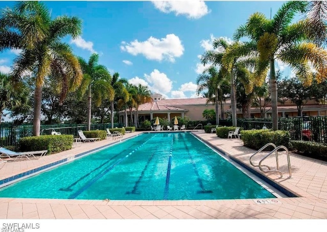 3613 Exuma Way, Naples, FL 34119 - community pool featuring fence and a patio area
