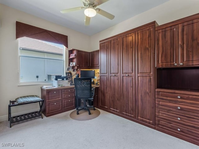 home office with carpet flooring and ceiling fan