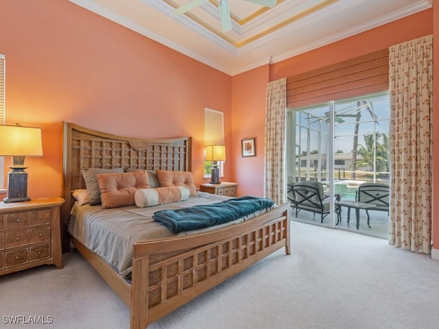 carpeted bedroom featuring ornamental molding, access to outside, and ceiling fan