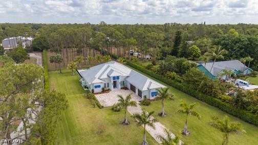 6145 Sea Grass Ln, Naples, FL 34116 - aerial view of property and surrounding area featuring a forest