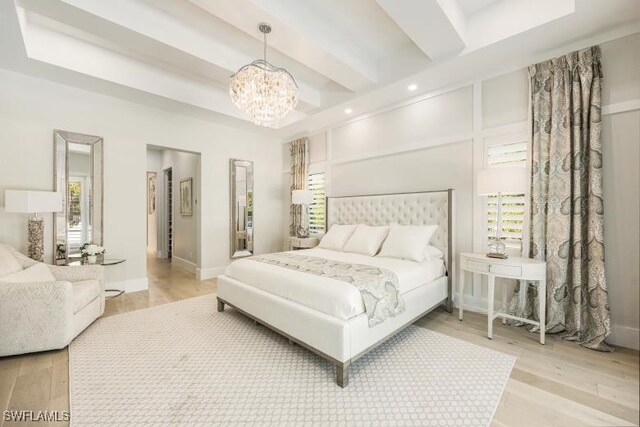 6145 Sea Grass Ln, Naples, FL 34116 - bedroom featuring a chandelier, multiple windows, light wood-style floors, beamed ceiling, and recessed lighting