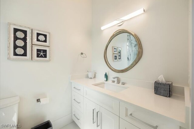 6145 Sea Grass Ln, Naples, FL 34116 - bathroom featuring vanity and toilet