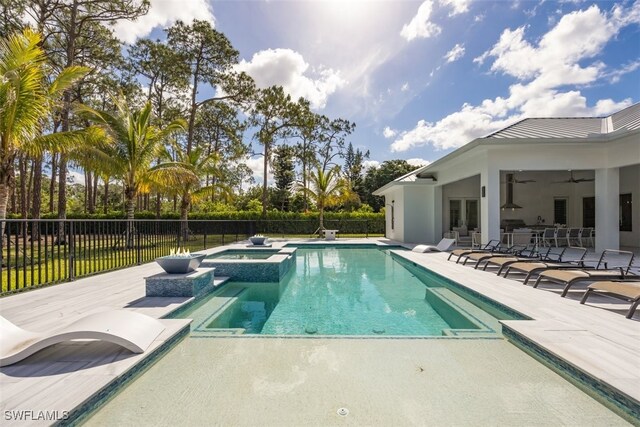 6145 Sea Grass Ln, Naples, FL 34116 - view of swimming pool with an in-ground hot tub, fence, ceiling fan, and a patio area