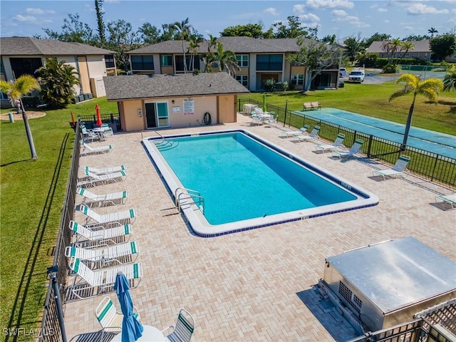 16881 Davis Rd Unit 412, Fort Myers, FL 33908 - community pool featuring a patio and a residential view