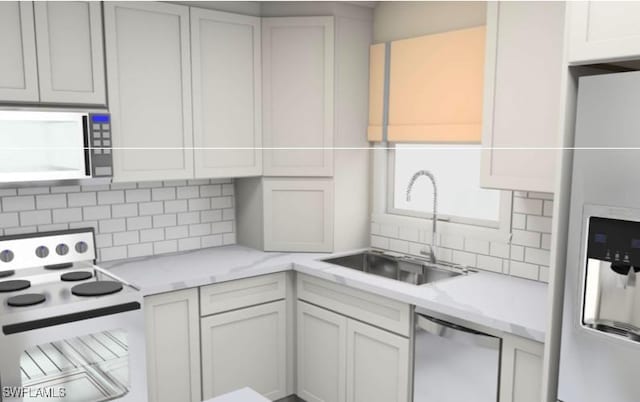 16881 Davis Rd Unit 412, Fort Myers, FL 33908 - kitchen with stainless steel appliances, a sink, decorative backsplash, and light stone counters