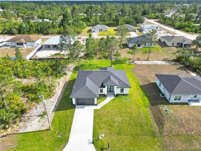 2815 32nd St W, Lehigh Acres, FL 33971 - aerial perspective of suburban area