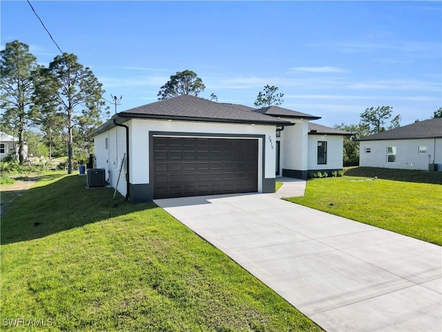 2815 32nd St W, Lehigh Acres, FL 33971 - view of front of property with stucco siding, cooling unit, a garage, concrete driveway, and a front lawn