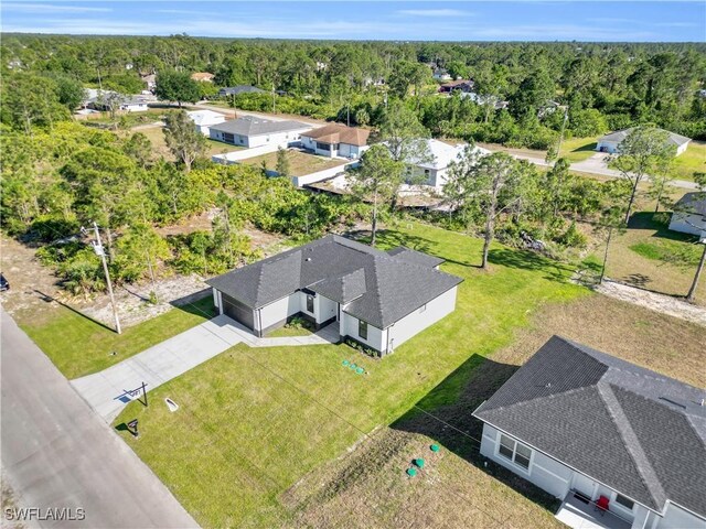 2815 32nd St W, Lehigh Acres, FL 33971 - aerial view of a heavily wooded area